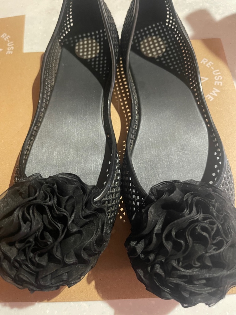 Melissa Black Perforated Ballet Flats with Rosette Accent